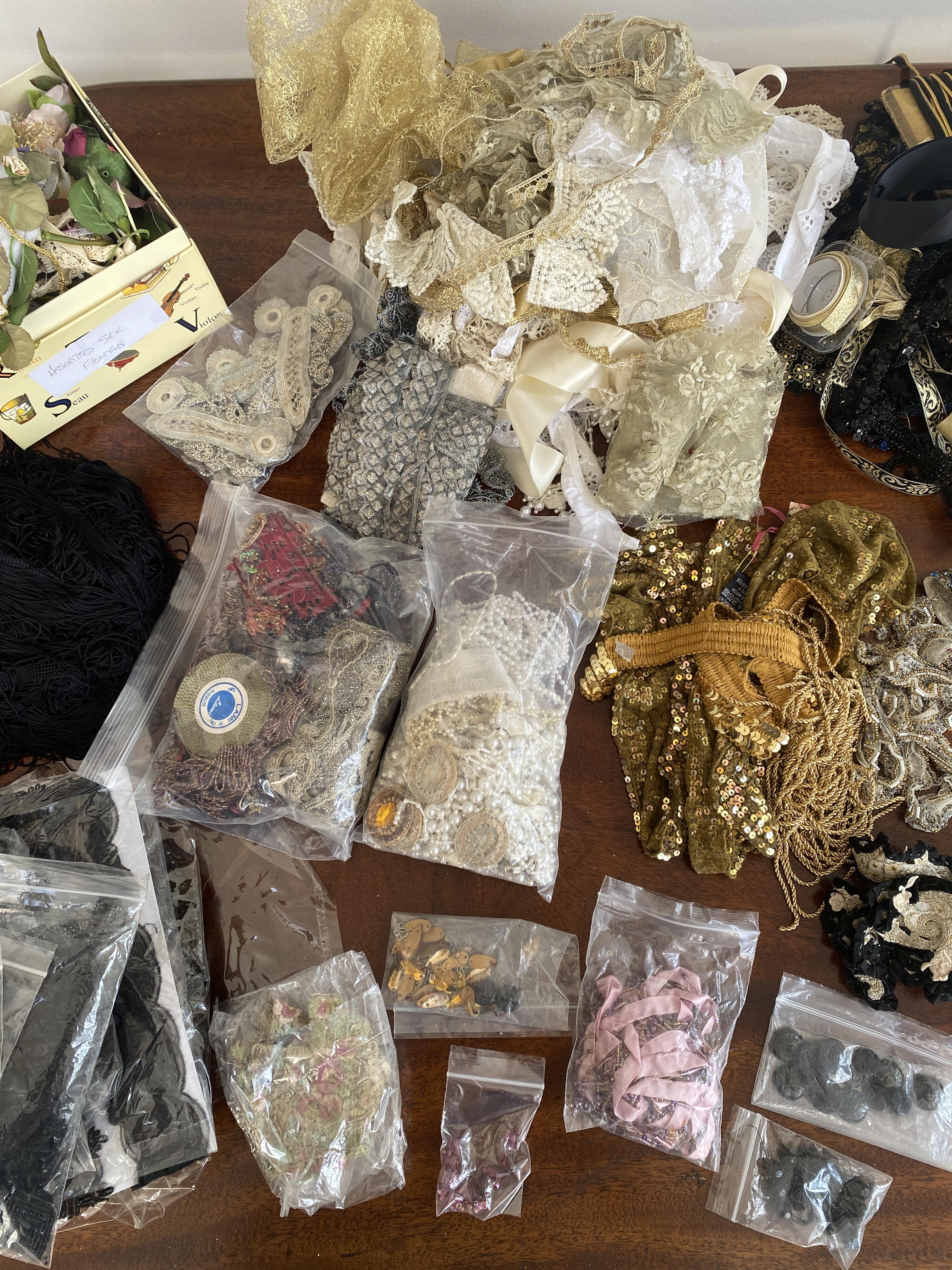 A large lot of costume trims – mix of vintage and modern, and antique beaded/lace pieces in black, cream, white, reds and pink ribbons and lace trims